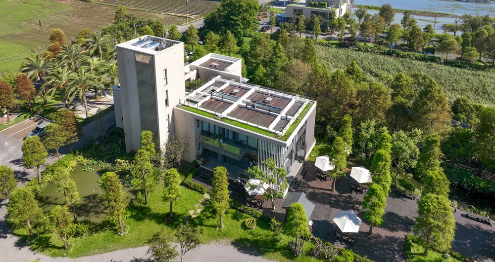 Aerial view of Flower Villa Restaurant, its terrace and surrounding trees